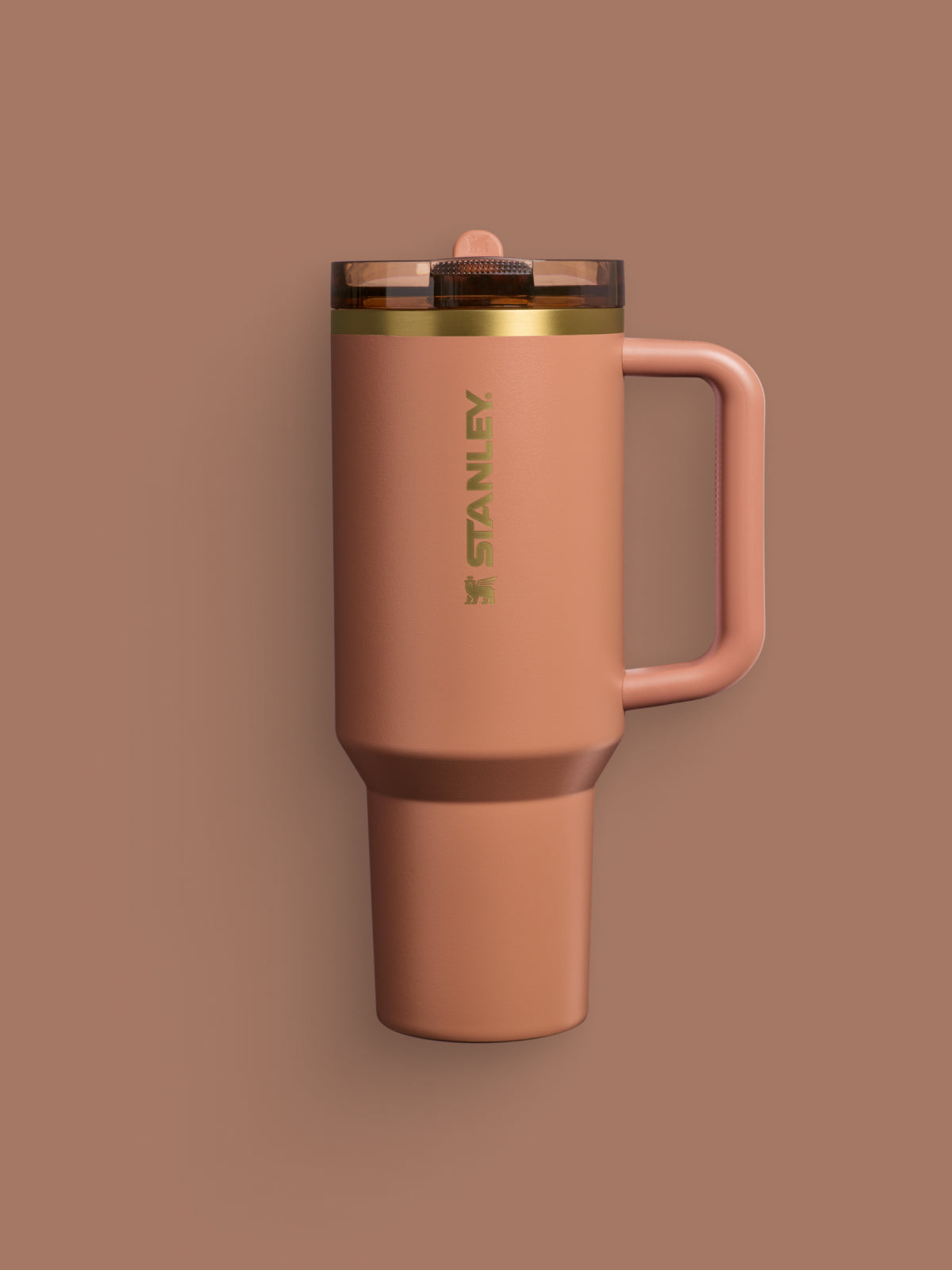 Stanley Fall Collection Tumbler in Mocha Latte Brown with gold accents on a brown backdrop