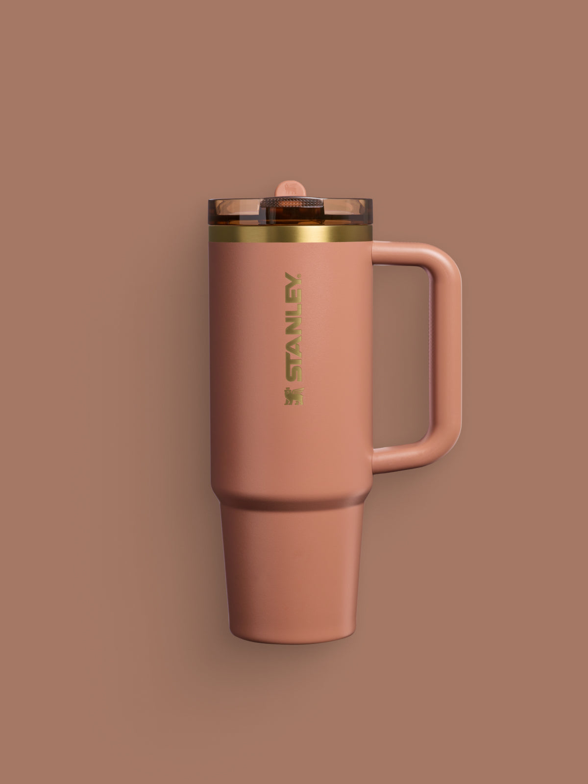 Stanley Fall Collection Tumbler in Mocha Latte Brown with gold accents on a brown backdrop